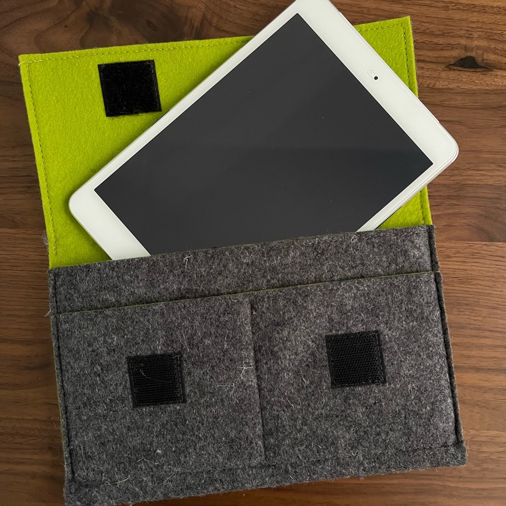Felt iPad Mini storage bag. With two pockets for accessories, Velcro closure